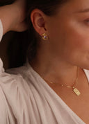 Nærbilde av melodie øredobb i lavendel